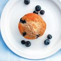 Lightly sweet delicious Fresh Blueberry Muffins are chock-full of fresh berries and made healthier with whole wheat flour.