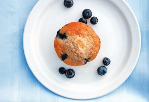 Lightly sweet delicious Fresh Blueberry Muffins are chock-full of fresh berries and made healthier with whole wheat flour.