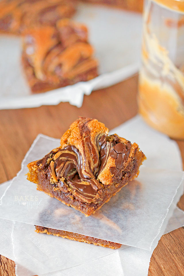 soft, chewy peanut butter cookie base with a generous swirl of melted chocolate, these cookie bars are sure to be a summer time treat the whole family will love.