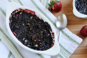 Rich chocolate topping over fresh strawberries make this decadent Strawberry Brownie Crumble a must try for the true brownie lover!